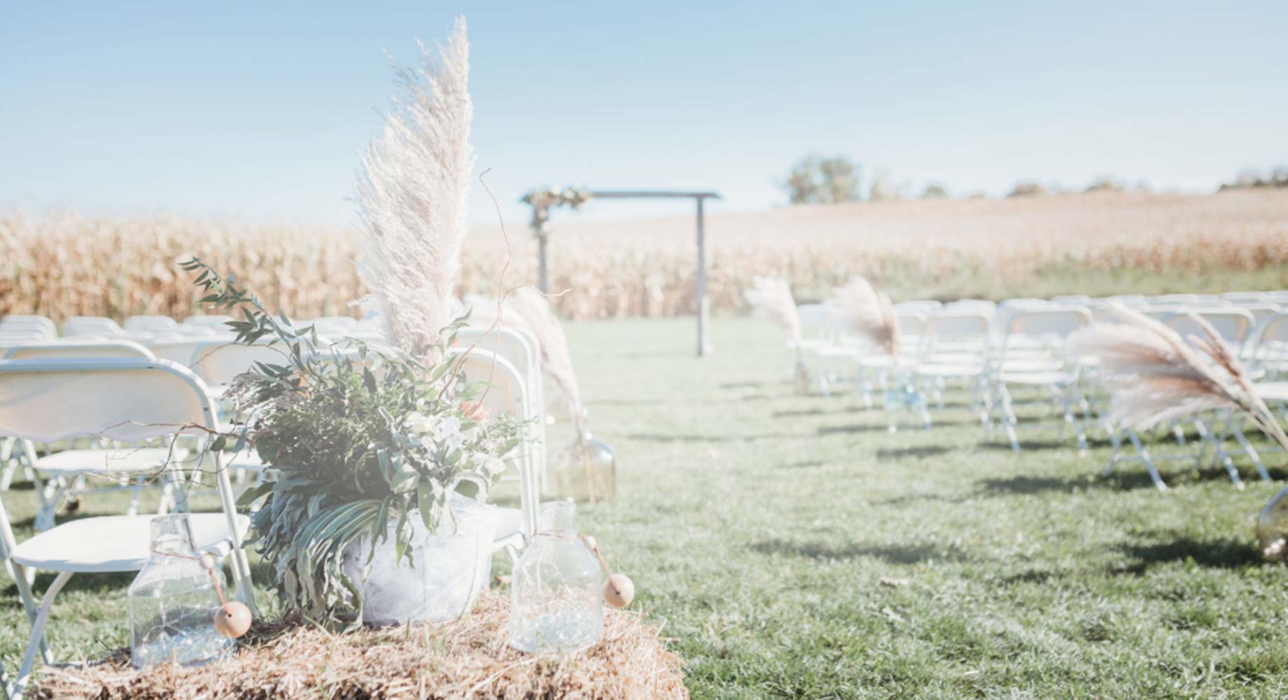 Farm wedding ceremony at the Rustique Barn, the Top Wedding Venue in Delano, MN.